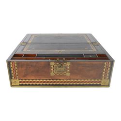 19th century rosewood writing slope, of rectangular form, the hinged cover and front with inlaid foliate engraved brass corner panels, and inlaid marquetry and brass diamond borders, the cover with foliate engraved and named central plaque, opening to reveal a fitted and compartmented interior with gilt tooled black leather slope, H21cm W50cm D28.5cm