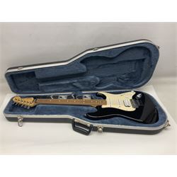 Mexican Fender Stratocaster electric guitar in black c2003 with Floyd Rose tremolo system, serial no.MZ3129600; L98cm; in Freestyle fitted case with 2006 Diamond Anniversary booklet