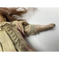 Victorian wax shoulder head doll with applied hair, inset glass eyes and jointed body with composition lower limbs; faded pink dress H35cm