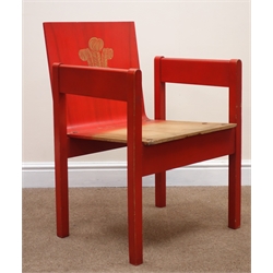  'Red Chair' of the investiture of the Prince of Wales, Prince Charles at Caernarfon Castle on July 1 1969, beech wood frame, olive ash veneer, vermilion red with the Prince of Wales feathers, manufactured by disabled workers at the Remploy factory, Bridgend, W54cm  