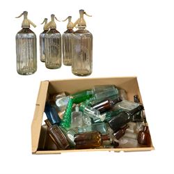 Five Schweppes soda water bottles, together with other vintage glass bottles 