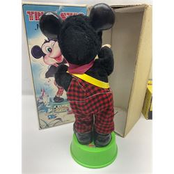 Mickey Mouse Trick Star battery operated drummer figure; Illco Mickey Mouse battery operated Fun Castle Roller Coaster; battery operated Western Express Locomotive; and JK Wells Fargo Overland Stage scale model; all boxed (4)