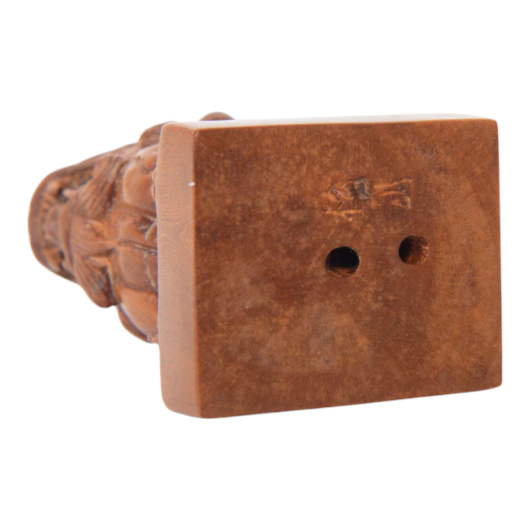  Two wooden netsuke, in the forms of a foo dog and a chicken, both signed to the base, H6cm