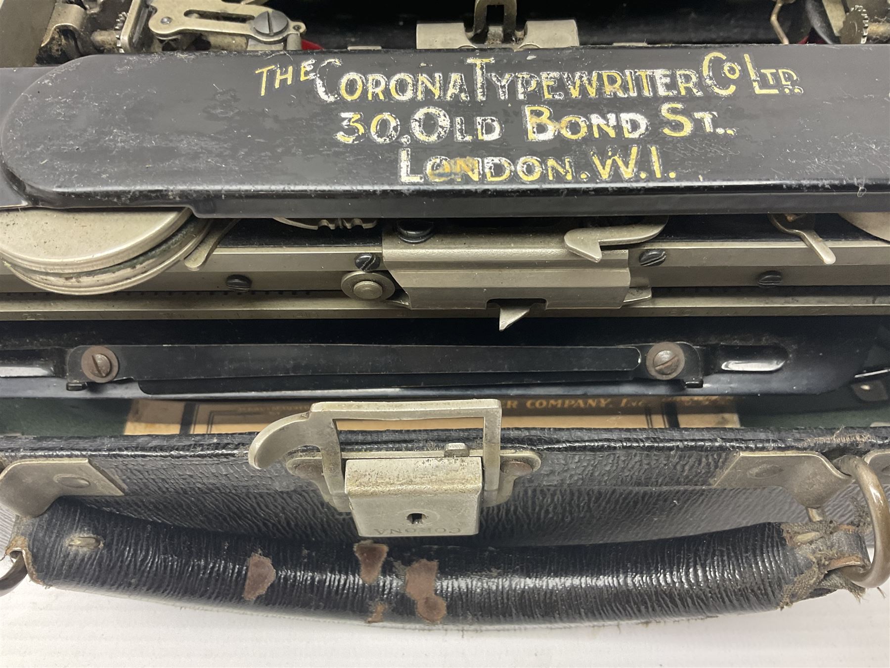 Corona typewriter in case, together with a grey angle pose style lamp