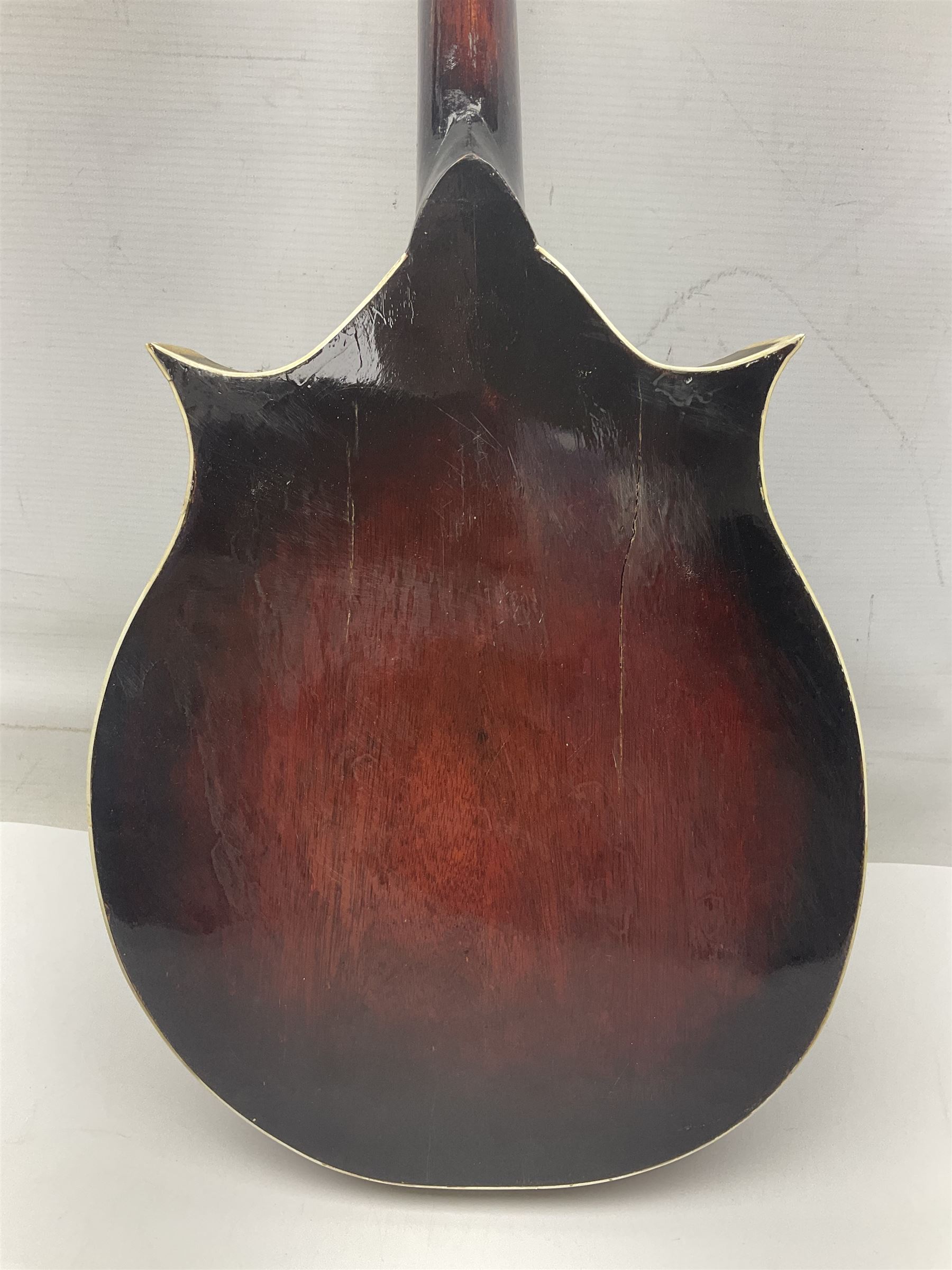 Eastern eight-string mandolin with sunburst finish and mother-of-pearl inlay L68.5cm; and another Harmony mandolin with cracked headstock (2)