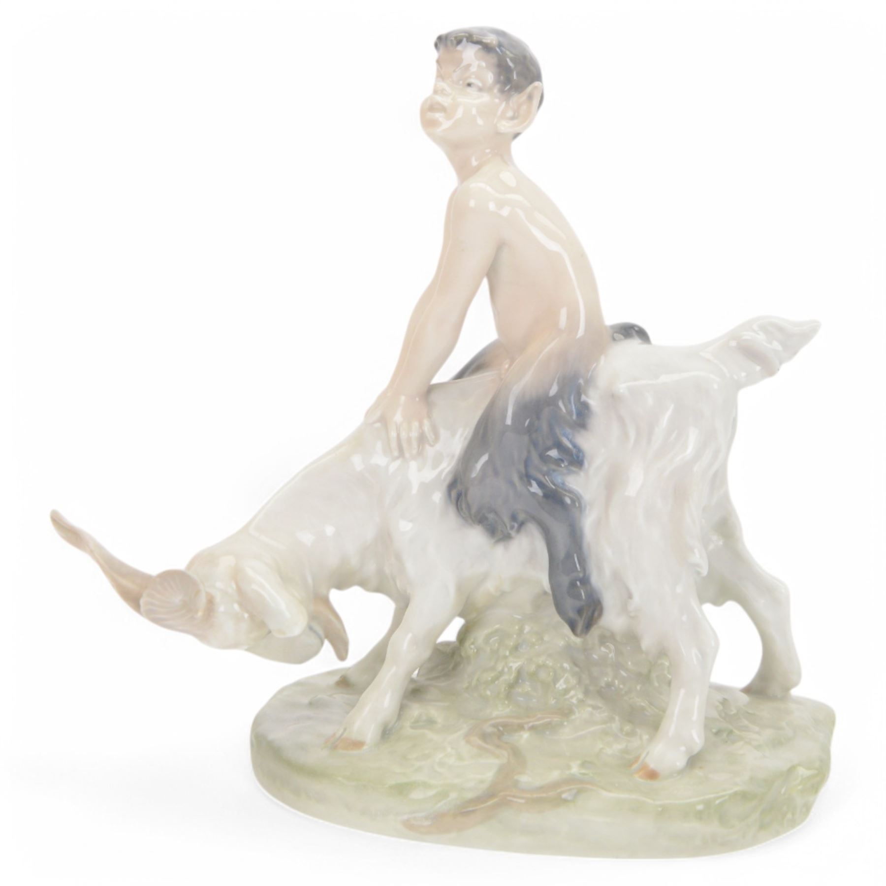 Royal Copenhagen Faun riding a goat no 737, together with Fawn and Parrot no. 752