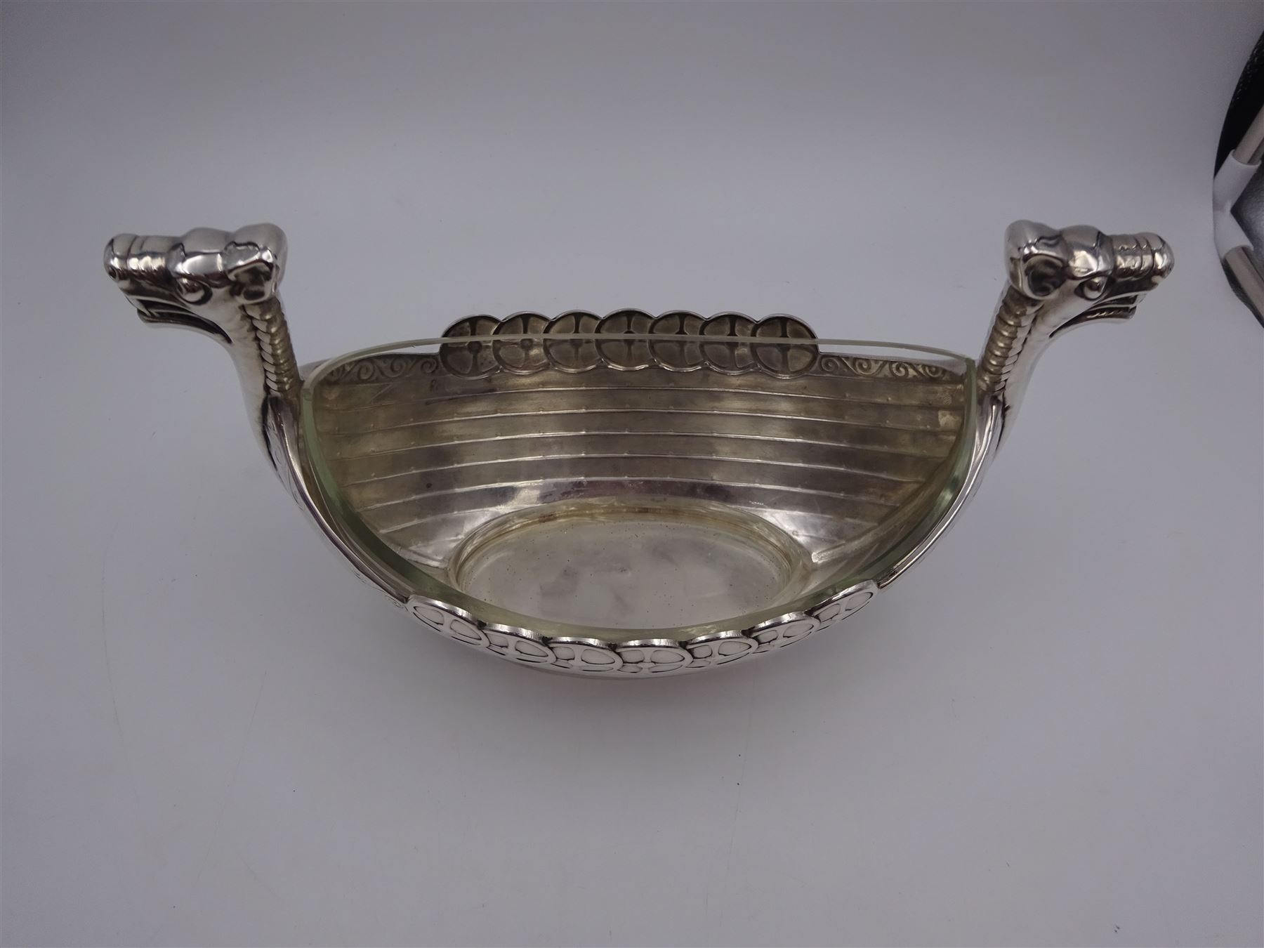 Silver plated novelty sugar bowl, in the form of a viking longship, with clear glass liner, stamped Alpacca to base, H15.5cm