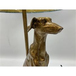 Composite table lamp, modelled as a gilt seated whippet, with teal velvet shade, H71cm
