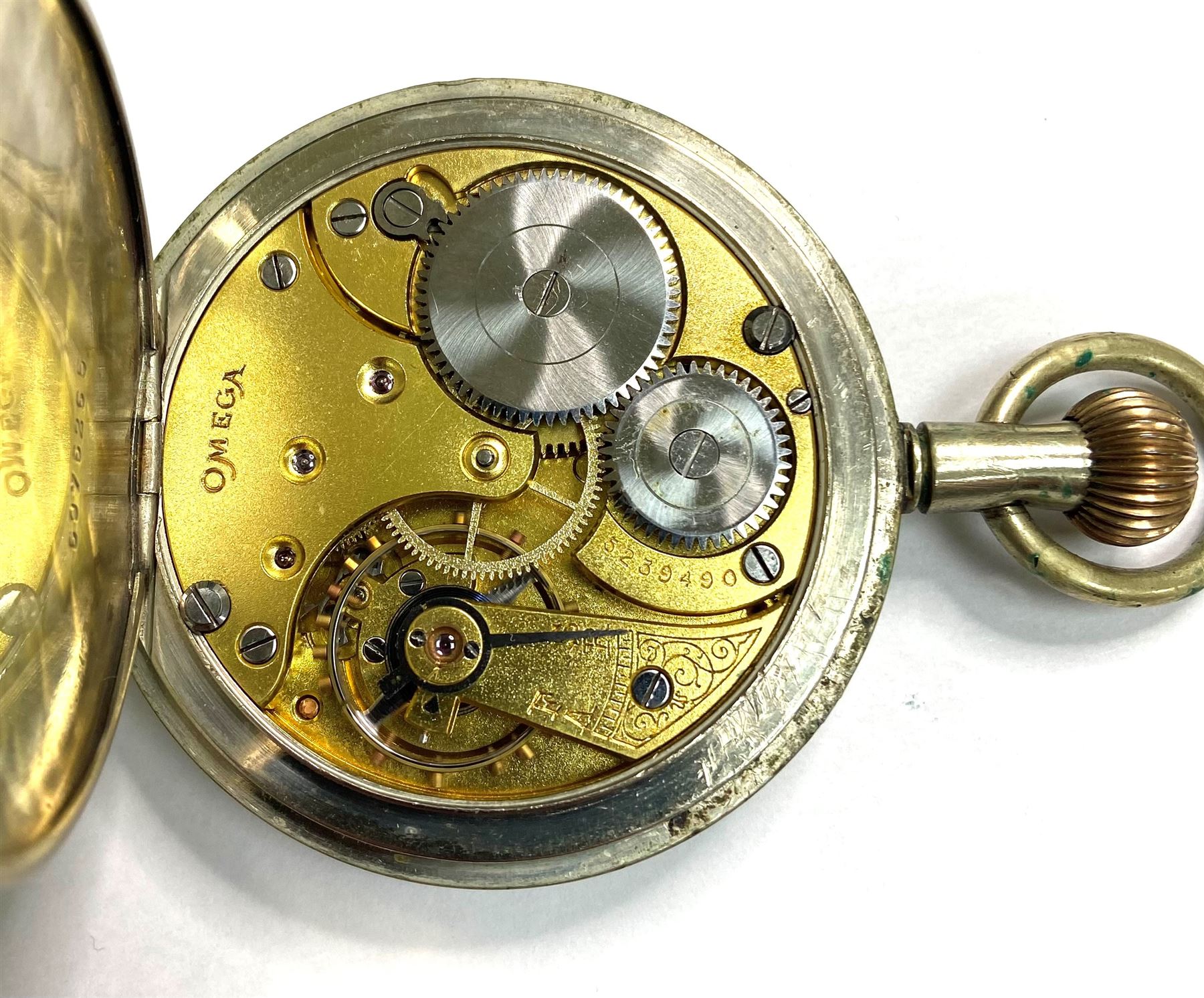 Royal Flying Corps Mark V military pocket watch by Omega, No. 5239490, black dial with Arabic numerals and subsidereary seconds dial, marked 30 hour non-luminous, B.B.7468, the case back with Broad Arrow beneath underlined A