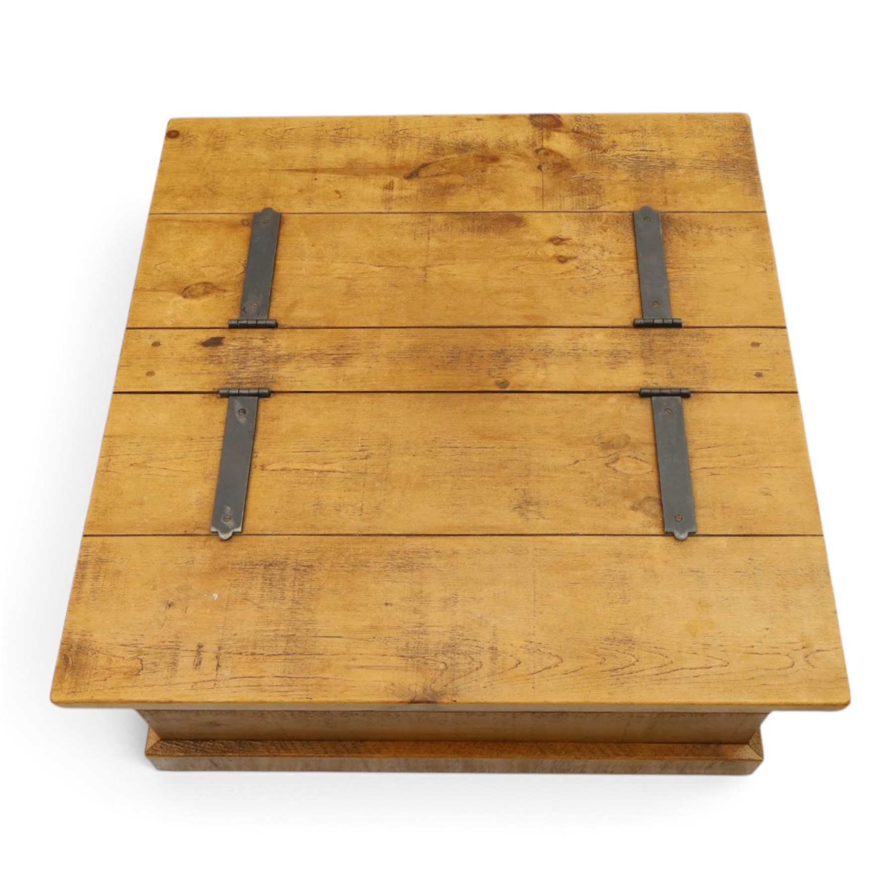 Indigo Furniture - rustic oak coffee table with double-hinged top concealing compartment, on skirted base