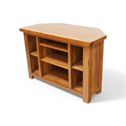 Oak corner television or media stand, fitted with adjustable shelves 