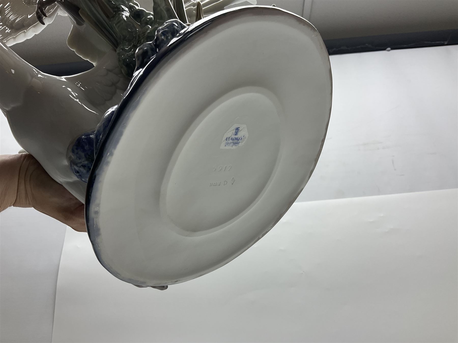 Large Lladro figure group, Swans Take Flight, modelled as two swans upon raised on circular wooden plinth, sculpted by Salvador Debon, H68cm