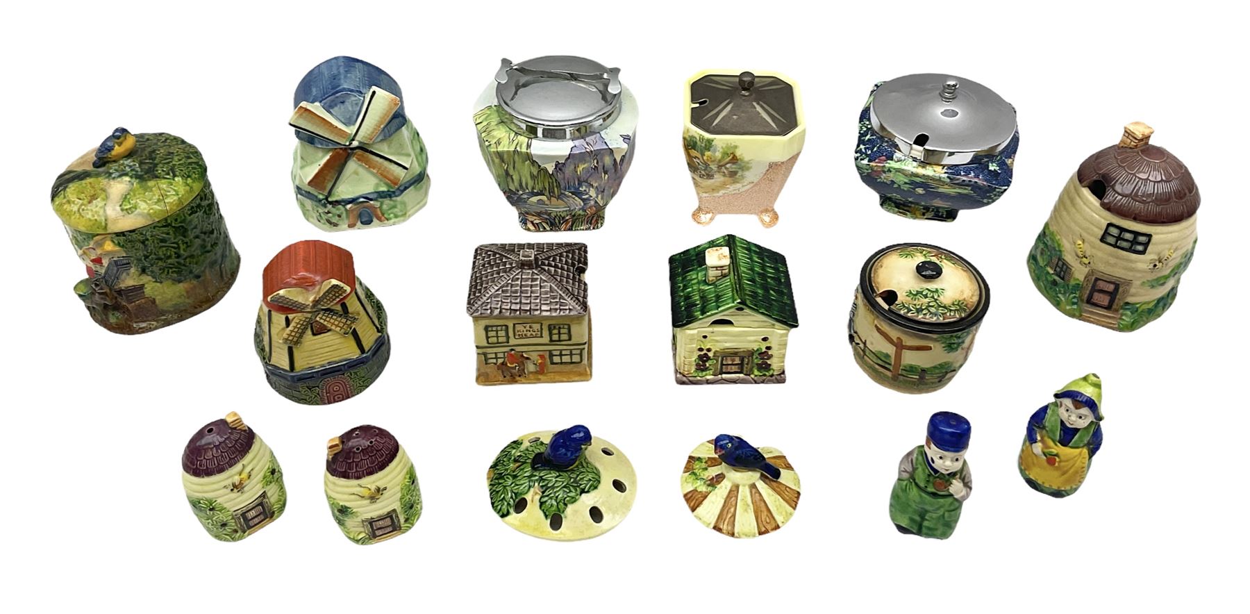 Collection of Japanese Maruhon ware novelty preserve pots, to include examples modelled as a windmill and cottages, together with other 1920s and 30s Art Deco style preserve pots, etc