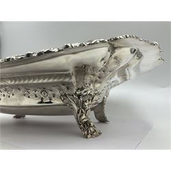Large Victorian silver dish, of oblong form with embossed foliate decoration and cast foliate, scroll and palmette rim, upon four foliate cast feet, hallmarked W & G Sissons, London 1895, H9.5cm L36cm W27cm