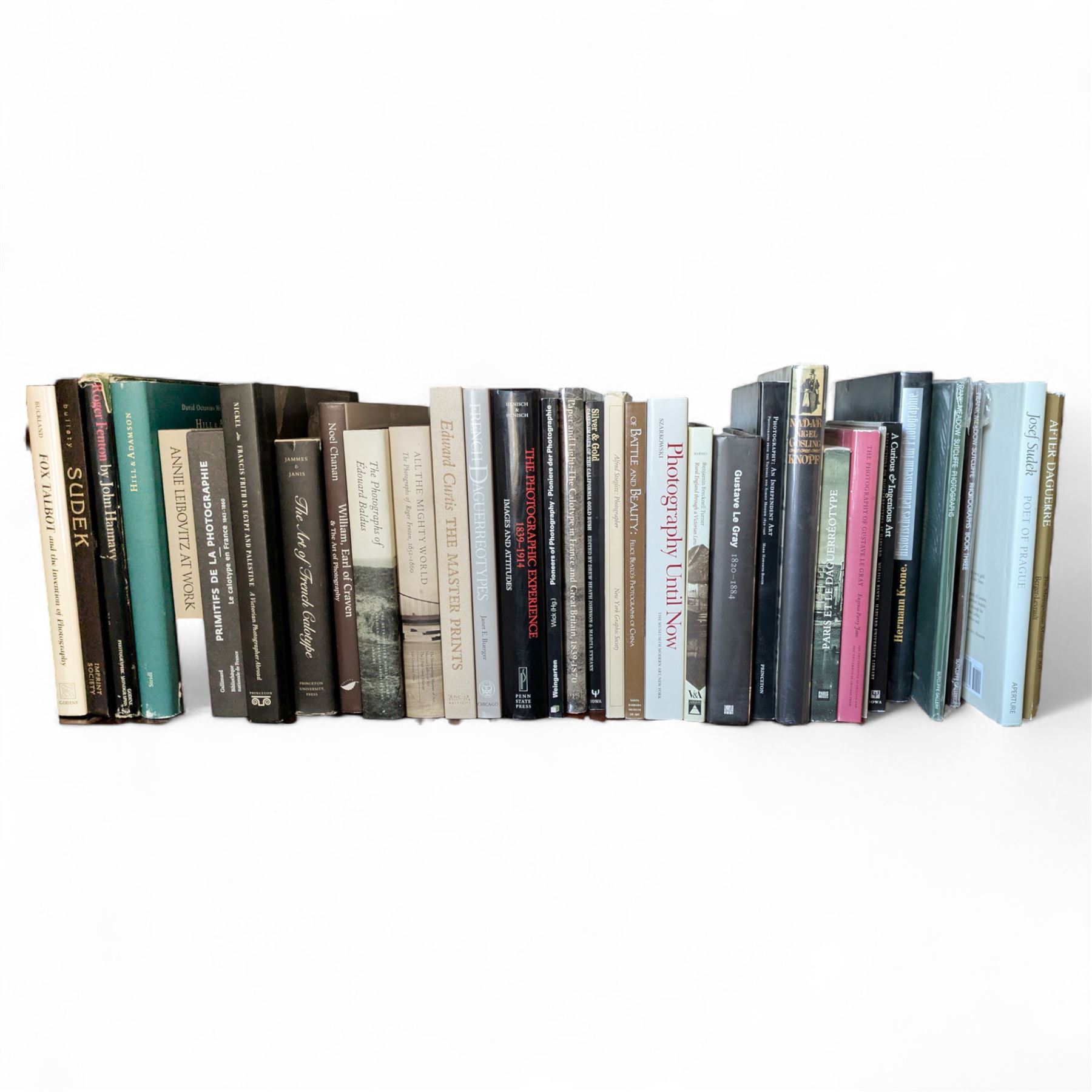 Large collection of photography history reference books, including Muybridge's Complete Human and Animal Locomotion, three volumes, 1979, The Photographers of Constantinople, two volumes in slipcase, and The Origins of American Photography, Julia Margaret Cameron, the complete photographs, Nadar (1820-1910), Portfolio, Electa Editrice, Milano, 1979, in English and Italian, with 12 plates of black and white photographs, including portraits of Charles Baudelaire, Hector Berlioz and Eugène Delacroix, limited edition of 1000 copies, approximately 121 books in total, full list on request, and additionally various Photography Auction Catalogues, including Quillan Collection, Girault de Prangey, Marie Therese & Andre Jammes Collection 1999 & 2008, Lewis Carroll's Alice, Paul F. Walter Collection et al