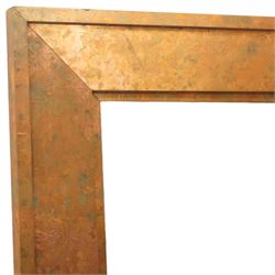 Large contemporary distressed copper effect framed wall mirror, stepped frame enclosing a bevelled mirror plate