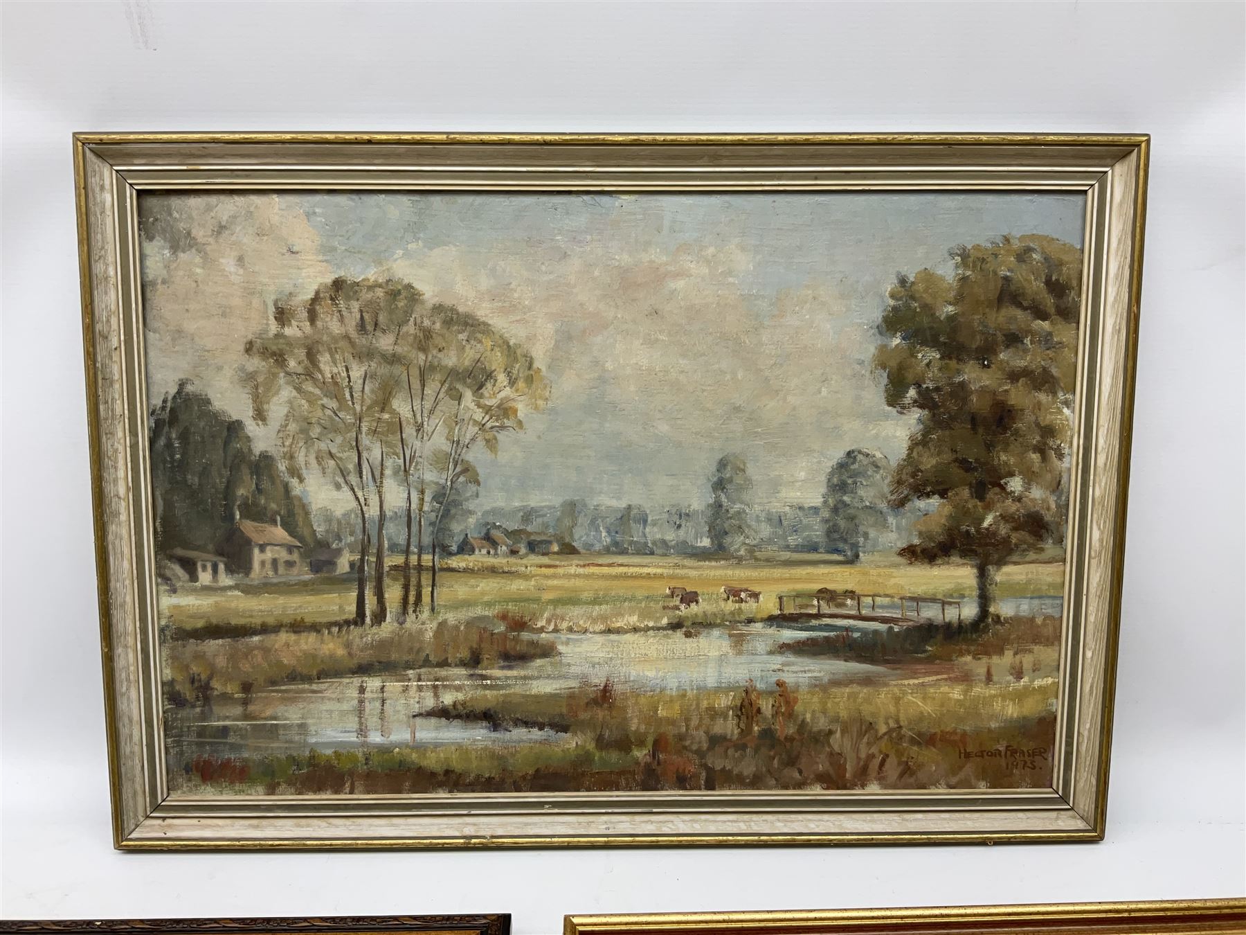 Hector Fraser (British 20th century): 'River Meadow', oil on board signed and dated 1973 together with two similar oils by different hands max 40cm x 60cm (3)