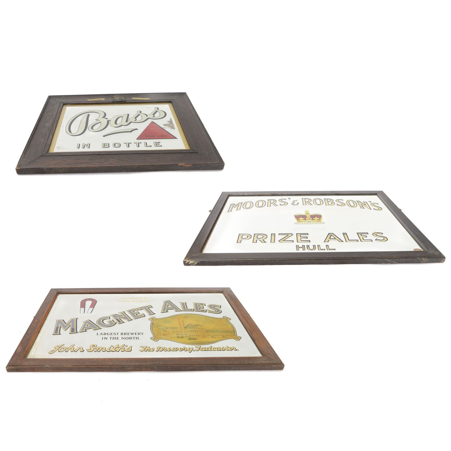 Three advertising mirrors, comprising Moors' & Robson's Prize Ales Hull, Magnet Ales, and Bass in Bottle (3)