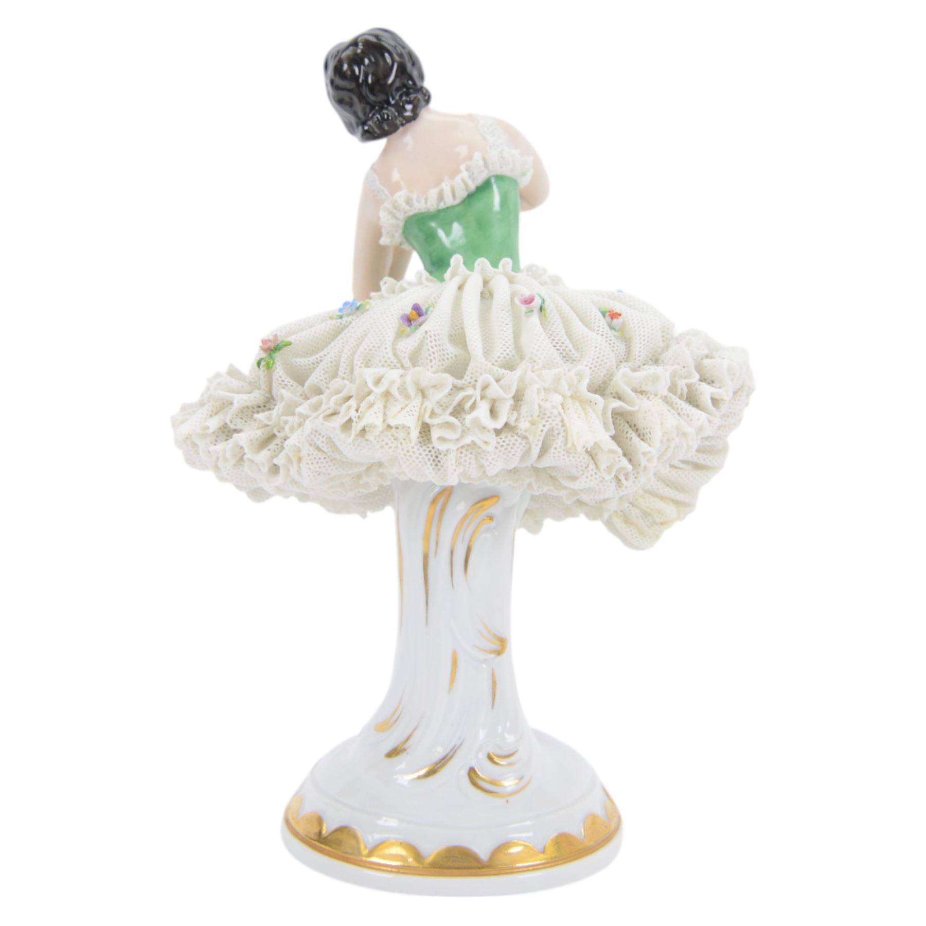 Two Continental lace figures, each modelled as a female dancer with lace skirts and lace trimmed bodice, upon a gilt detailed base, each marked beneath, tallest example H23cm