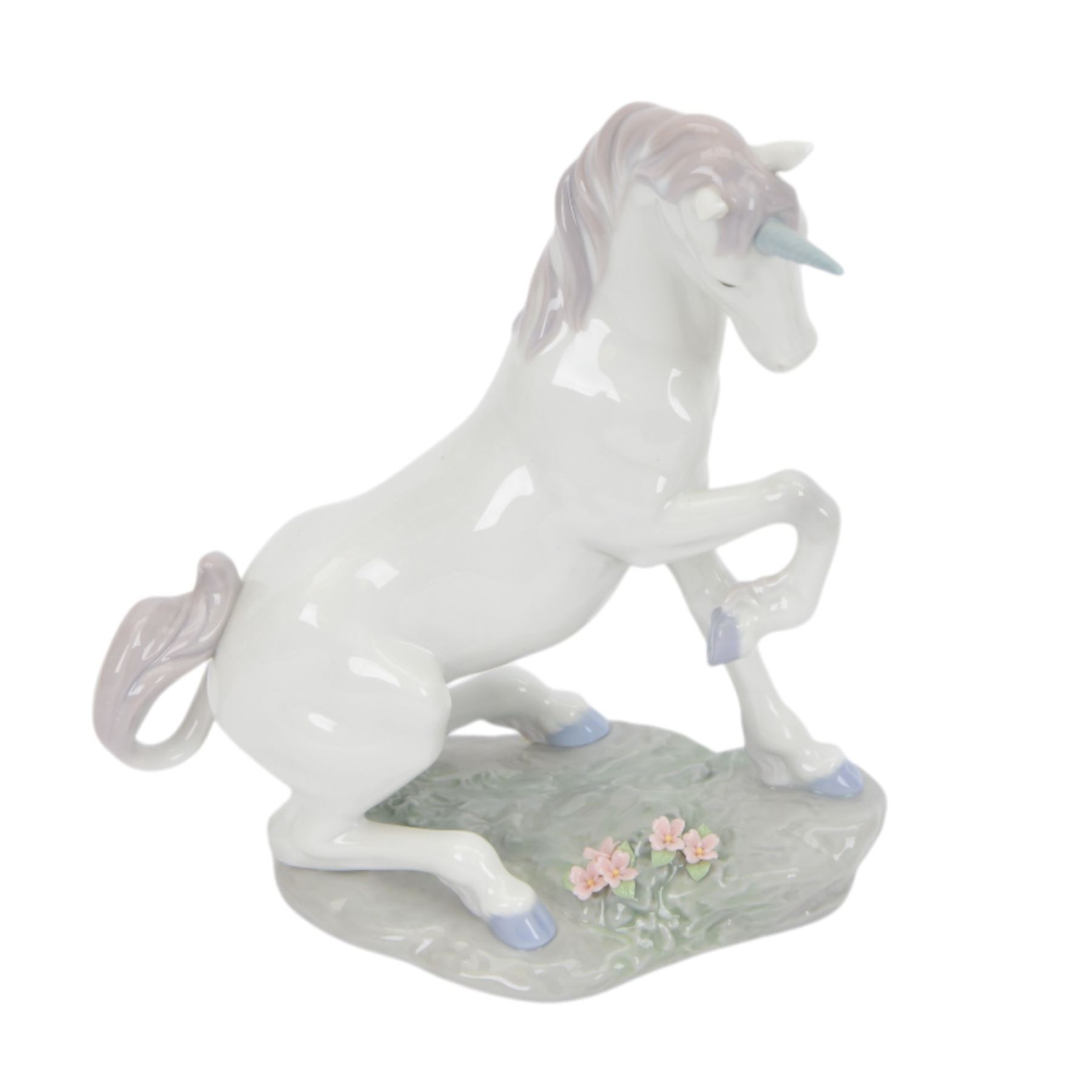 Three Lladro figures, comprising  Magical Unicorn no 7697, Prince of Elves no 7690 and Princess of the Fairies no 7694, all with original boxes 