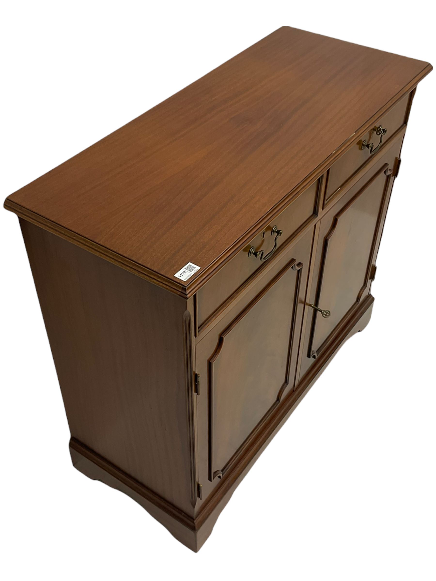 Reproduction mahogany side cabinet, moulded rectangular top over two drawers and double cupboard, bracket feet