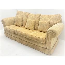 Duresta Waldorf Grande - three seat sofa (L230cm, D100cm) and matching armchair (W115cm, D100cm), scroll arms, upholstered in a pale gold foliate patterned fabric with matching scatter cushions 