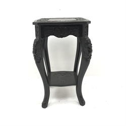 Ebonised heavily carved two tier jardiniere stand, cabriole legs, W43cm, H71cm, D42cm