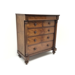  Victorian figured mahogany Scotch chest, single frieze drawer above two short and three long drawers flanked by two columns on turned supports, W124cm, H138cm, D59cm  