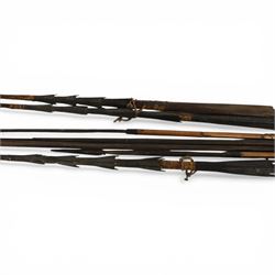 Papua New Guinea tribal fishing spears, together with carved boat 