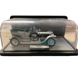 1907 Rolls Royce Silver Ghost cased, together with a collection of other diecast models 