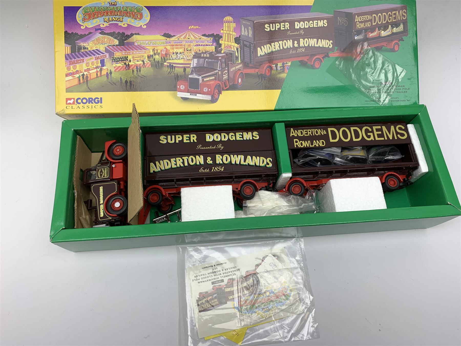 Corgi Showmans Range - twelve vehicles comprising 24801 Leyland Dodgem Truck & Caravan Set, 16501 Scammell Highwayman Ballast with Closed Pole Trailer & Caravan Set, 15901 Scammell Highwayman Generator with Closed Pole Trailer & Dodgem Trailer Set, 16502 Scammell Highwayman Ballast with Closed Pole Trailer & Caravan Set, 21701 AEC Closed Pole Truck with Closed Pole Trailer Set, 12601 Foden Closed Pole Truck Set, 27801 Atkinson Open Pole Truck Set, 09901 ERF Dodgem Truck & Box Trailer Set, 27602 Atkinson 8 Wheel Rigid Truck & Trailer with Loads Set, 24401 Leyland 8 Wheel Rigid Truck Set, 16101 Scammell Highwayman Crane Set and 06601 Morris 1000 Advanced Publicity Van Set; all virtually mint and boxed with certificates and paperwork (12)