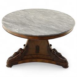 French mid-19th-century Second-Empire mahogany centre table with a dished grey-veined marble top, on a tapered triform pedestal with anthemion brass mounts above carved recumbent swan figures with delicately refined wings and graceful necks curving backwards, associated with the Empress Josephine, raised on three small platform bases
