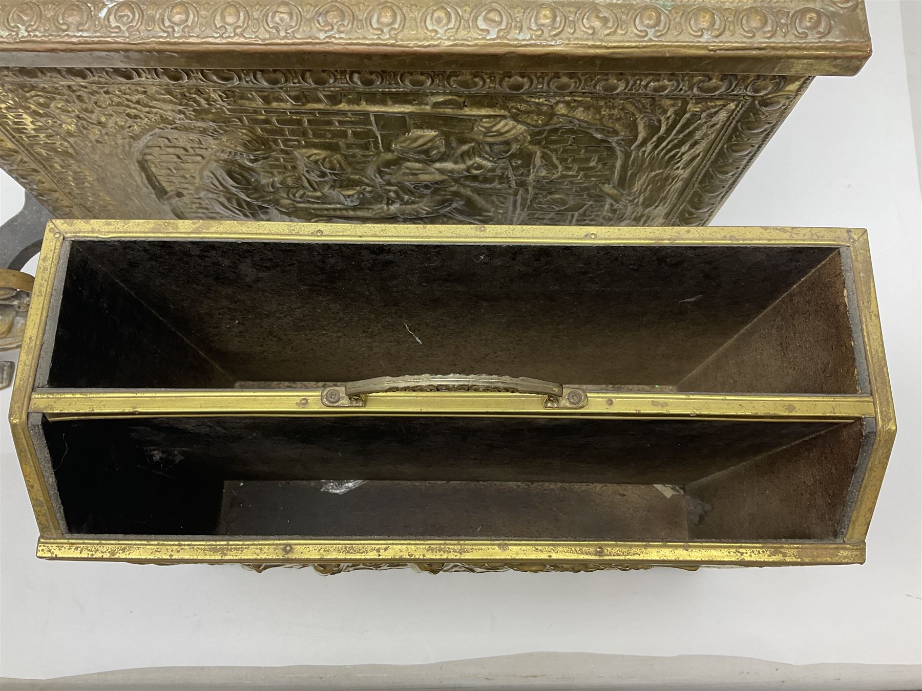 Pair of brass and iron fire dogs, together with brass coal box embossed to the lid with figures and a brass magazine rack, coal box H32cm