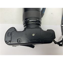 Cameras and accessories, to include Olympus OM101 Power Focus camera body, serial no 1076067, with 'Sigma AF Zoom 1:38, f=75 200mm' lens, serial no 2053714, Canon EOS 5000 camera body, serial no 1507812, with 'Canon Zoom EF 80-200mm, 1:4.5-5.6' lens, other cameras, by Miranda, Coronet and Ricoh and a collection of lenses, carry cases, etc 