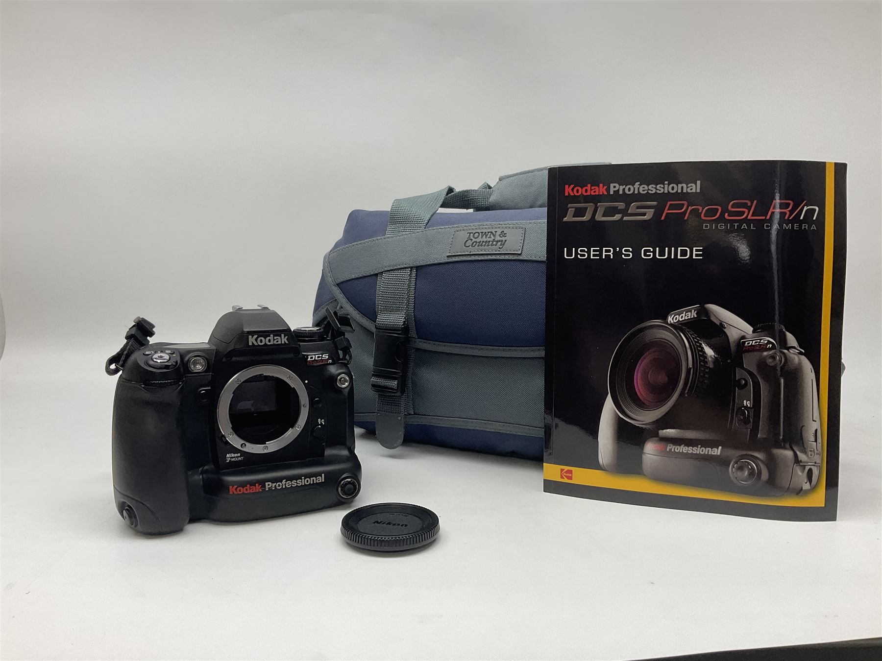 Kodak DCS pro, with Nikon F80 mount, serial no. PSLRN24607, with three batteries, charged, instruction manual and a carry case