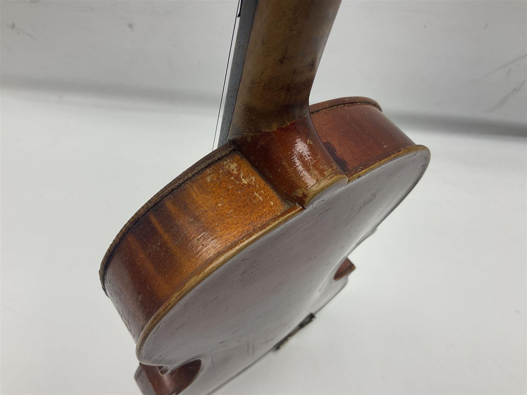 Early 20th century German Saxony three-quarter size violin with 34cm one-piece maple back and ribs and spruce top L55.5cm overall; in ebonised wooden 'coffin' case with bow