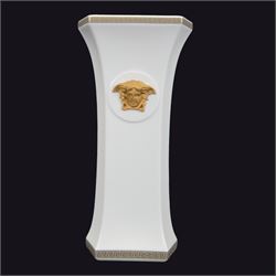 Rosenthal Versace Gorgona vase, of rectagular form with fluted base and rim, decorated in relief with medusa masks and gilt greek key borders upon a white ground, boxed, H25cm
