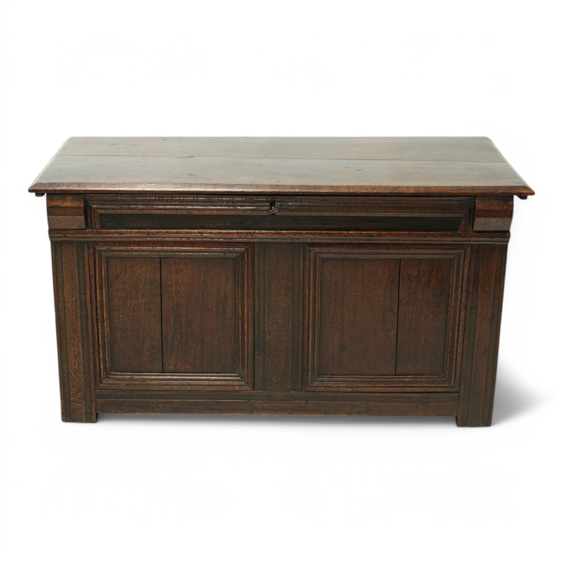 18th century oak blanket chest, chamfered rectangular hinged top over panelled front and sides, decorated with applied mouldings, on stile supports