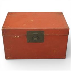 Chinese red leather trunk, rectangular hinged lid above a plain body with brass lock plate...