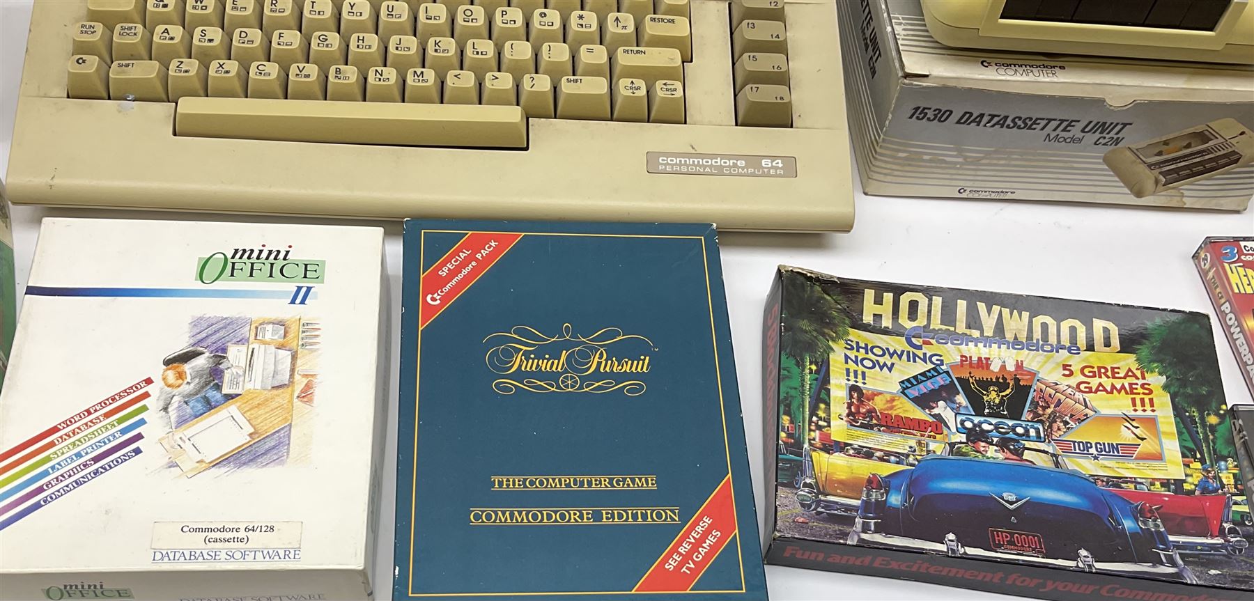 Commodore 64 games computer with boxed 1530 Datassette Unit Model C2N, two joysticks, over seventy games and twenty-two Commodore magazines; polystyrene box inner and card slip-case