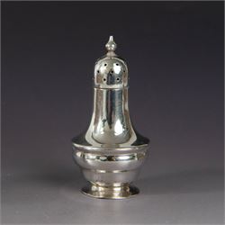 1930s silver three piece cruet set, comprising pepper shaker, open salt and mustard pot and cover, all of circular form upon circular spreading feet, hallmarked 	Atkin Brothers, Sheffield 1930, with two silver condiment spoons and blue glass liners