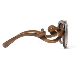 Prada - ‘Minimal Baroque’ oversized round sunglasses in smoky grey acetate, with graduated lenses and distinctive scroll-form temples, with gold-tone PRADA lettering to arm, in hard case