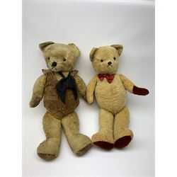 1950s English large wood wool filled teddy bear with swivel jointed head, glass type eyes and vertically stitched nose and mouth and jointed limbs with rexine paw pads H33