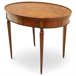 Aldam Heaton & Co (fl.1878-97) - late 19th century Sheraton revival style satinwood inlaid oval centre table, raised inlaid edge, centre with finely executed large central  inlaid medallion, surrounded by ribbon tied swags interspaced with medallions, frieze with rectangular symmetrical panels of foliate sprays of acanthus leaves, raised on four square section tapering legs with cavetti shaped shoulders with stringing on brass bulb feet, underside with bone plaque signed Aldam Heaton & Co, Baker St, London