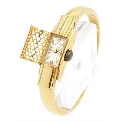 Primus ladies 18ct rose gold manual wind hidden wristwatch, on integral 18ct rose gold hinged torque bangle