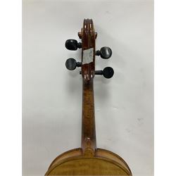 Copy of a full size Stradivarius violin, with an ebonised fretboard, tailpiece and tuning pegs, with a polished chin rest  Length 60cm