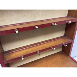 Miniature pitch pine Welsh dresser with open plate rack over two cupboard doors, displayed with Ridgways Humphrey's Clock pattern and other doll's blue/white tea ware, copper kettles and pan etc W41cm H72cm