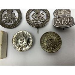 Three WW1 'Services Rendered' wound badges, nos.B333490, 180063 and 268702; two King's Badges 'For Loyal Service'; one in original box; hallmarked silver ARP badge; copy of Imperial German marine Pilot's badge; French 61st Airborne Signal Battalion badge marked Drago Paris; and French 403rd Anti-Aircraft Artillery Regiment badge by Arthus Bertrand (9)