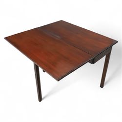 Georgian mahogany fold-over tea table, rectangular top with moulded edge over single frieze drawer with brass handle plate, on square tapering supports with gateleg
