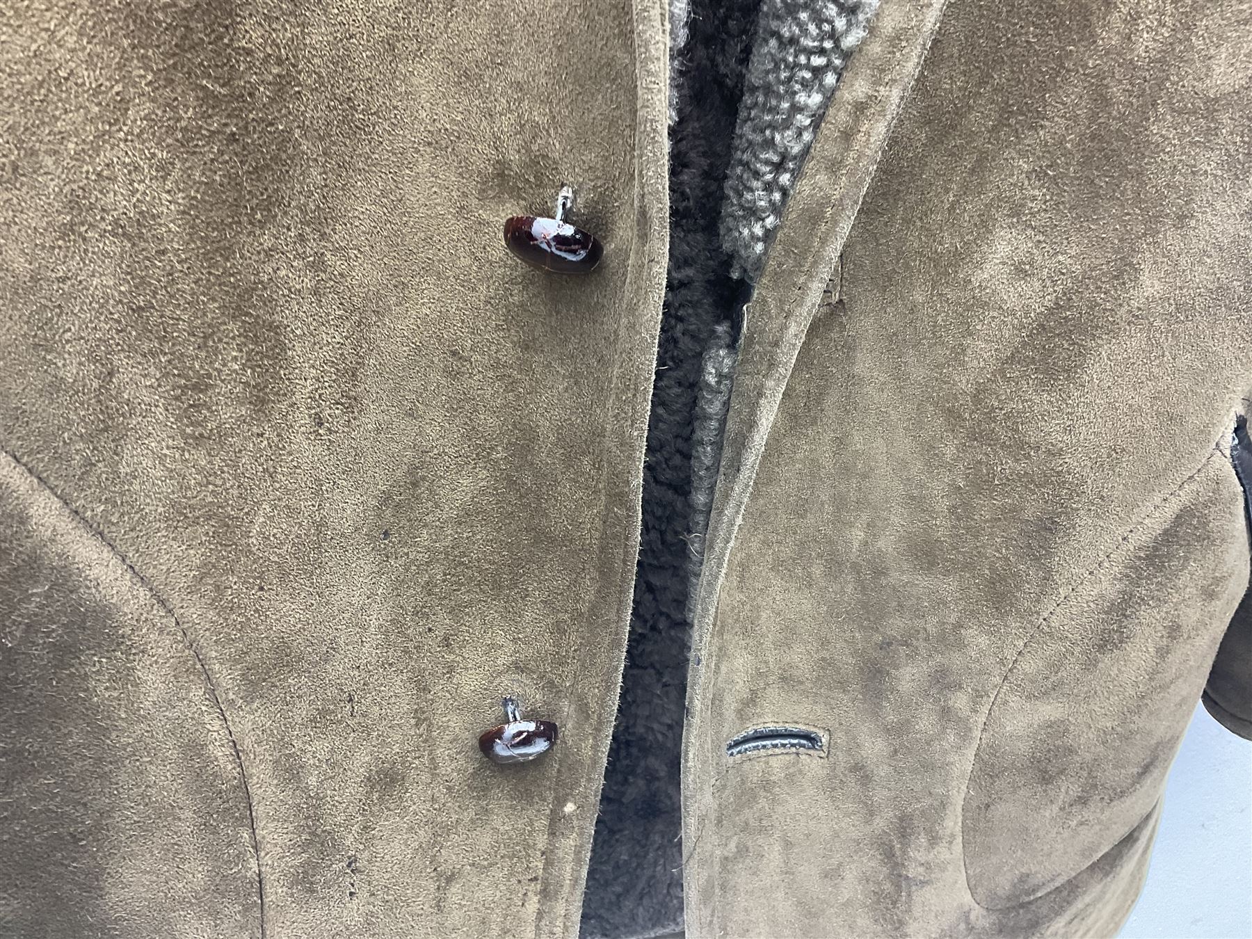 Two sheepskin jackets, one ladies jacket size 12, by Nurseys, and a gentleman's jacket by Baily's   